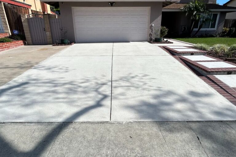 Concrete driveway transformed with StoneShine grinding service, achieving a clean, flawless finish in Southern California.