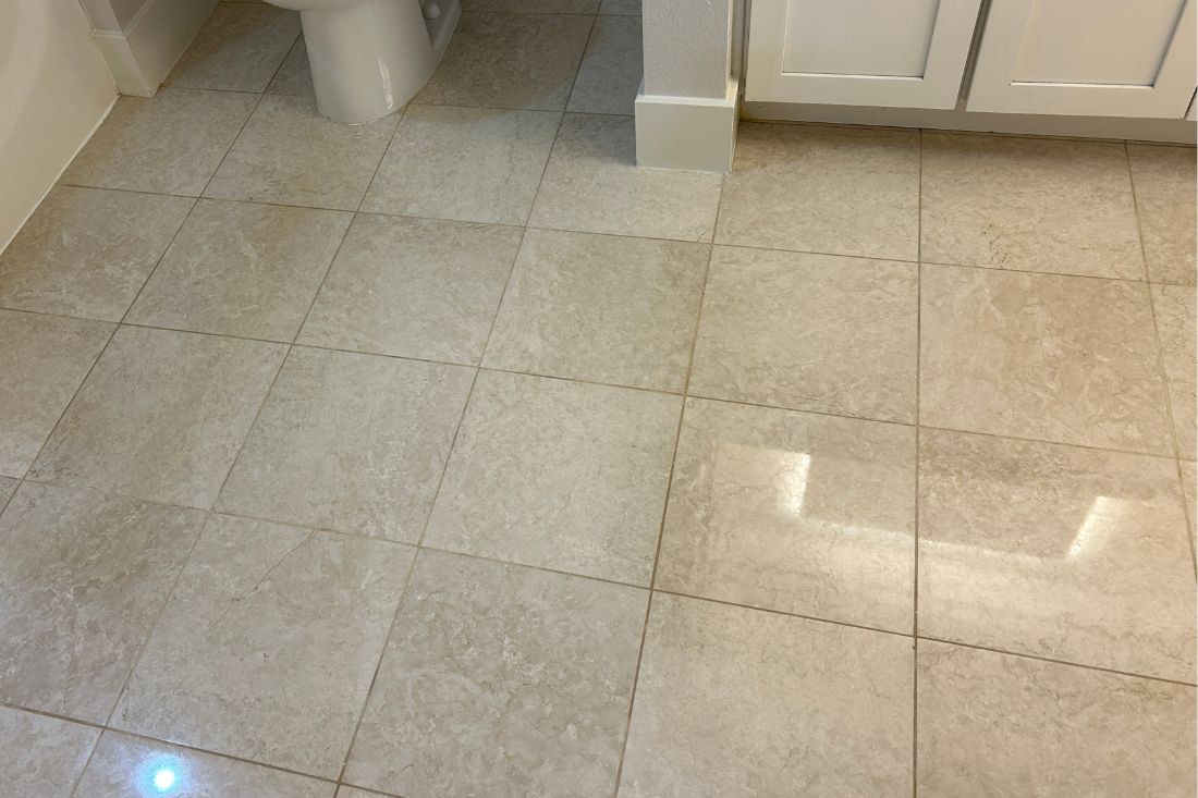 After photo of StoneShine's marble floor restoration service in Palm Desert. The bathroom floor features a smooth, polished finish with enhanced shine and a refreshed, elegant appearance.