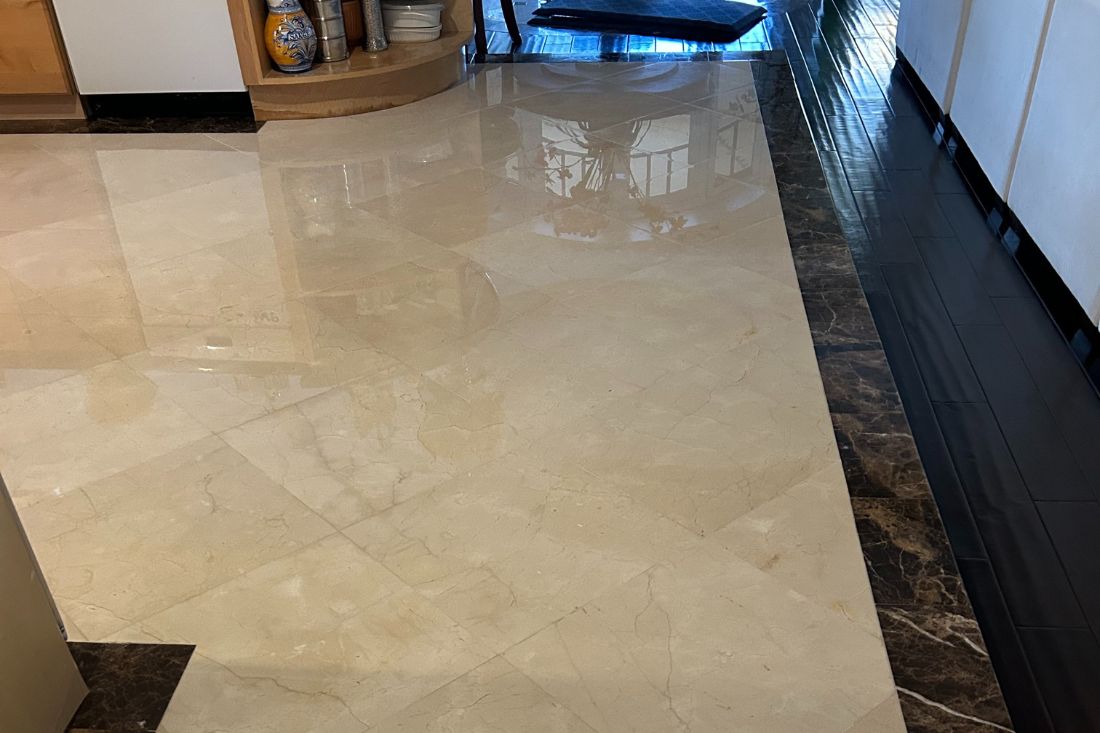 After photo of StoneShine's marble floor restoration service in Diamond Bar. The kitchen floor showcases the marble’s true color and natural beauty, with a smooth, refined finish that enhances the space’s elegance.