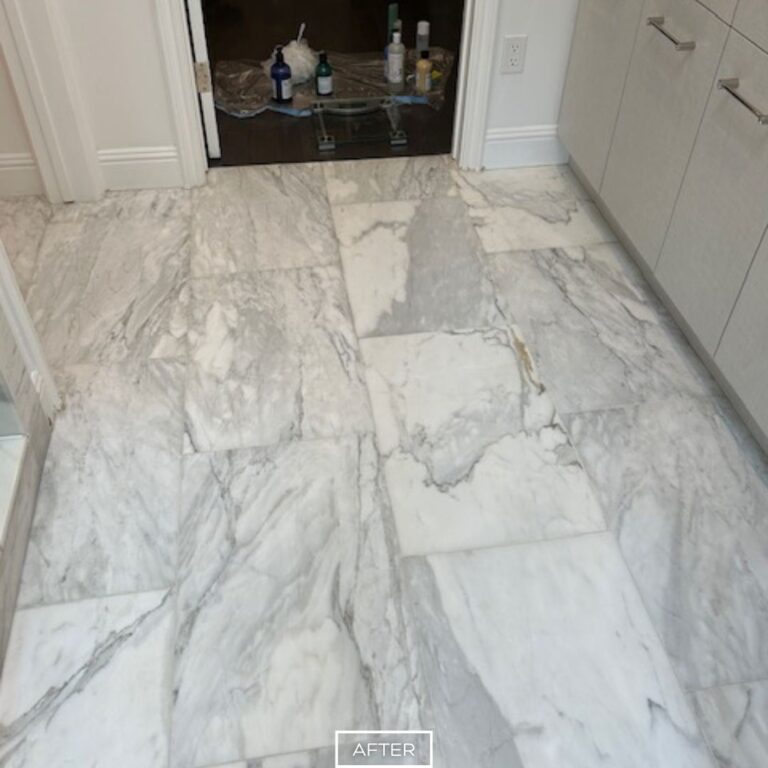 Refinished marble bathroom floor in Los Angeles with brightened tiles and intended to be matte finish