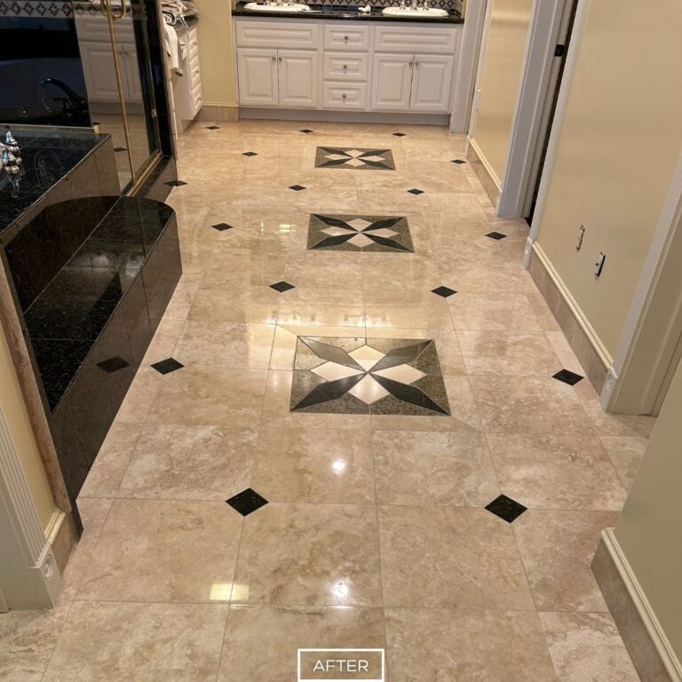 After travertine floor restoration in Diamond Bar highlighting detailed stonework with crisp diamond and star inlays and a high-gloss finish throughout the hallway.