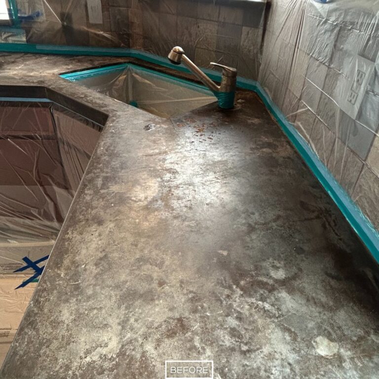 Before concrete grinding in Laguna Beach showing dull and uneven surface around sink area.