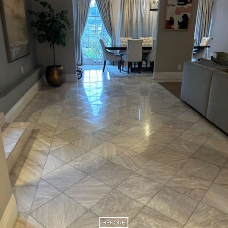 Dull marble tiles in Beverly Hills living and dining area prior to polishing