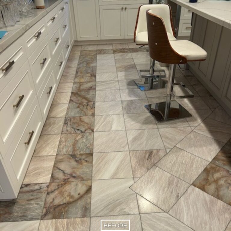 Dull marble floor in Beverly Hills kitchen before restoration