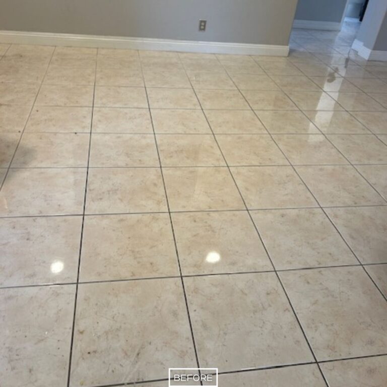 Marble floor with dull finish and visible grime before restoration in Orange living space