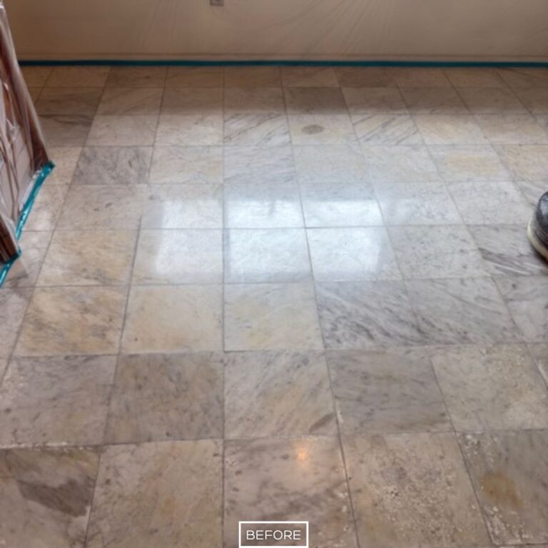 Dull and uneven marble floor with surface etches before restoration in Seal Beach home