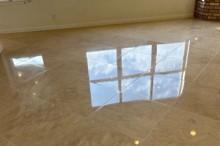 After restoration of limestone floor in San Juan Capistrano showing the mirror-like shine.