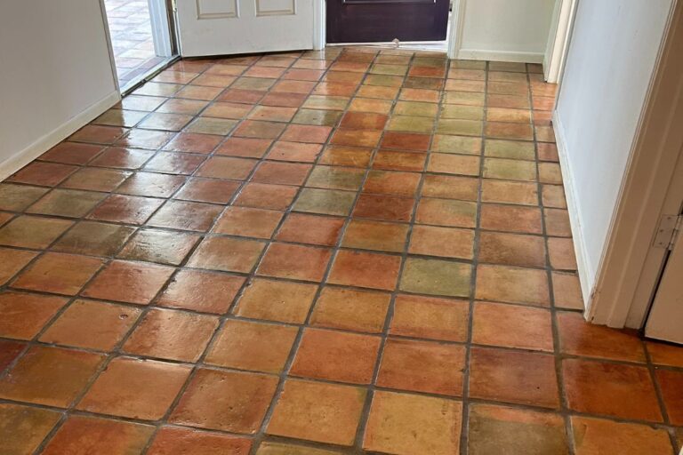 After StoneShine's Saltillo tile cleaning and sealing service in Rolling Hills Estates. The entryway floor showcases a vibrant, glossy finish with enhanced color and long-lasting protection.