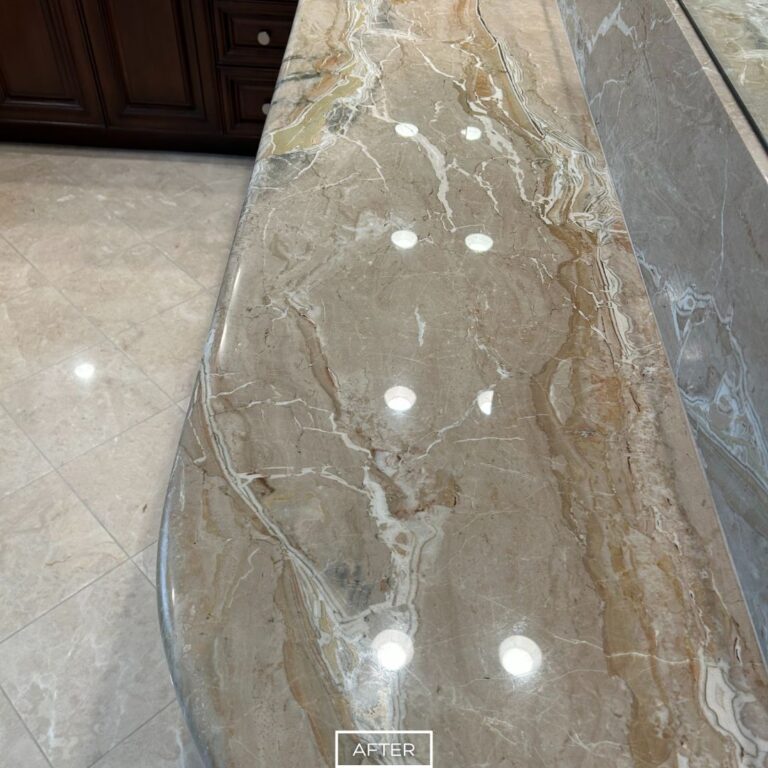 Restored marble countertop in Los Angeles after polishing, with a glossy reflective finish that highlights natural stone veining.