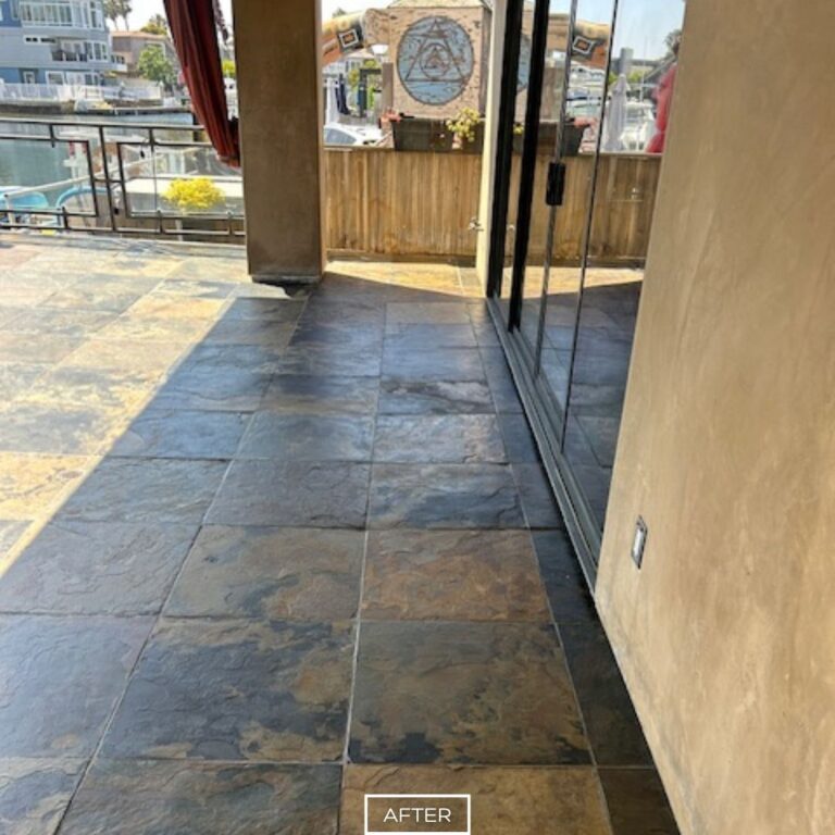 Restored slate floor in Seal Beach after cleaning and sealing, showing enhanced colors, clean and even finish.