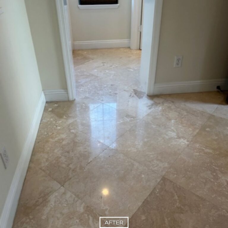 Restored tiles after travertine floor restoration in hallway with natural light near bedroom entrance