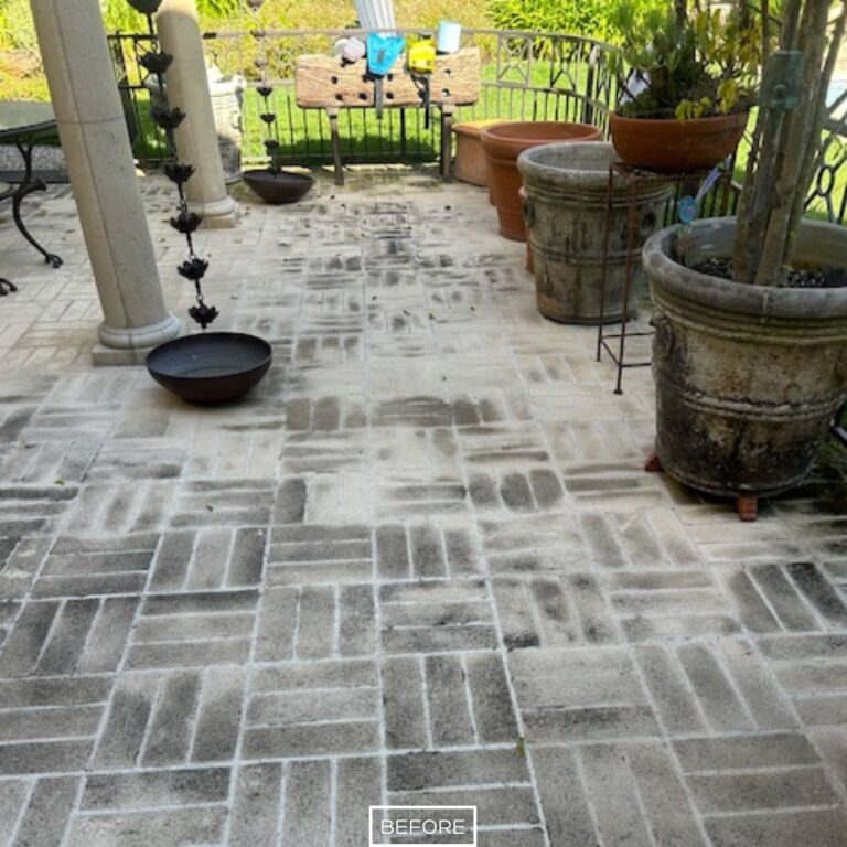 Before restoration of outdoor concrete paver patio in Beverly Hills with heavy dirt buildup and uneven color from weather exposure.