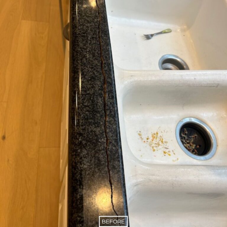 Granite countertop in Villa Park kitchen with visible long crack near sink before repair.