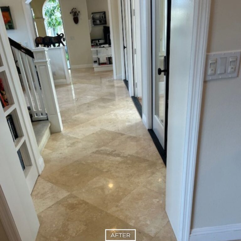 Restored travertine floor in residential hallway
