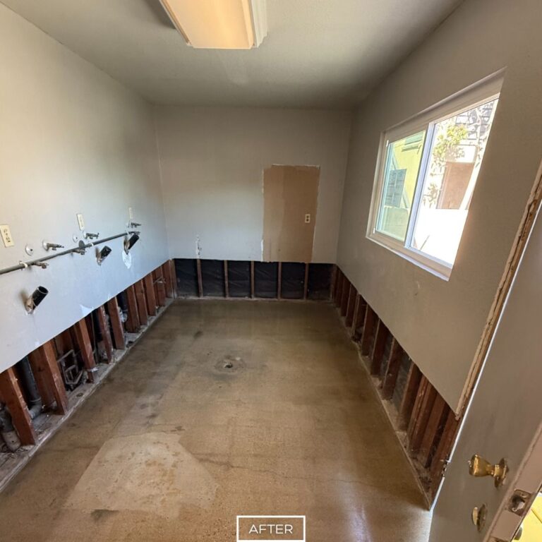 Restored concrete floor with smooth, polished finish, providing a clean look after old flooring removal and grinding.
