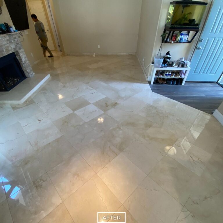 Restored marble flooring in Los Angeles home after polishing, with smooth finish and bright shine across open living space.