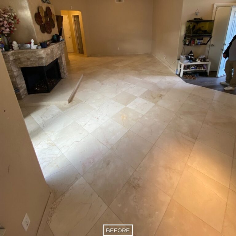 Marble floor in Los Angeles residence before restoration, with faded tiles across large open space.