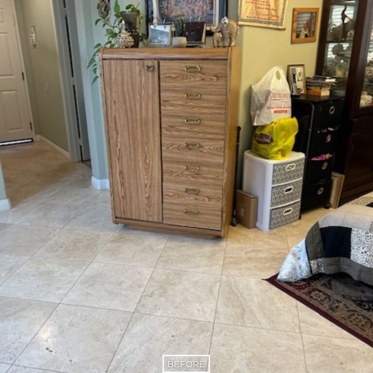 Travertine floor before restoration in Orange home with worn surface and embedded dirt.