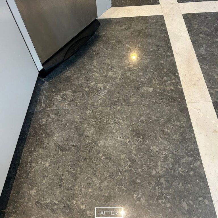 Restored limestone floor with a smooth finish in a Newport Beach kitchen