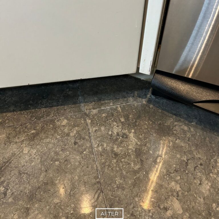 Clean and sealed limestone floor near cabinets in a Newport Beach home