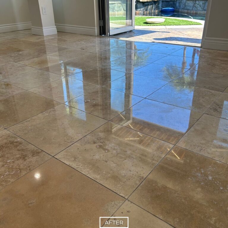 Polished travertine floor in Dana Point with reflective finish after restoration