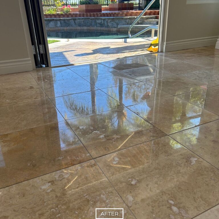 Restored travertine flooring in Dana Point with smooth glossy surface and shine
