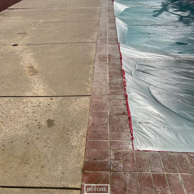 Before resurfacing of pool deck in Manhattan Beach with stains and discoloration