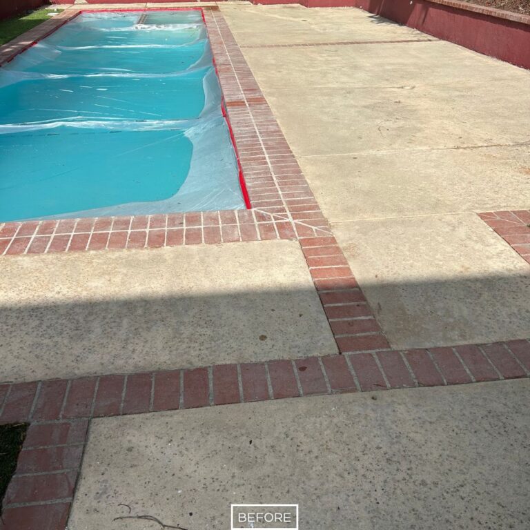 Before pool deck restoration in Manhattan Beach with uneven and worn concrete surface