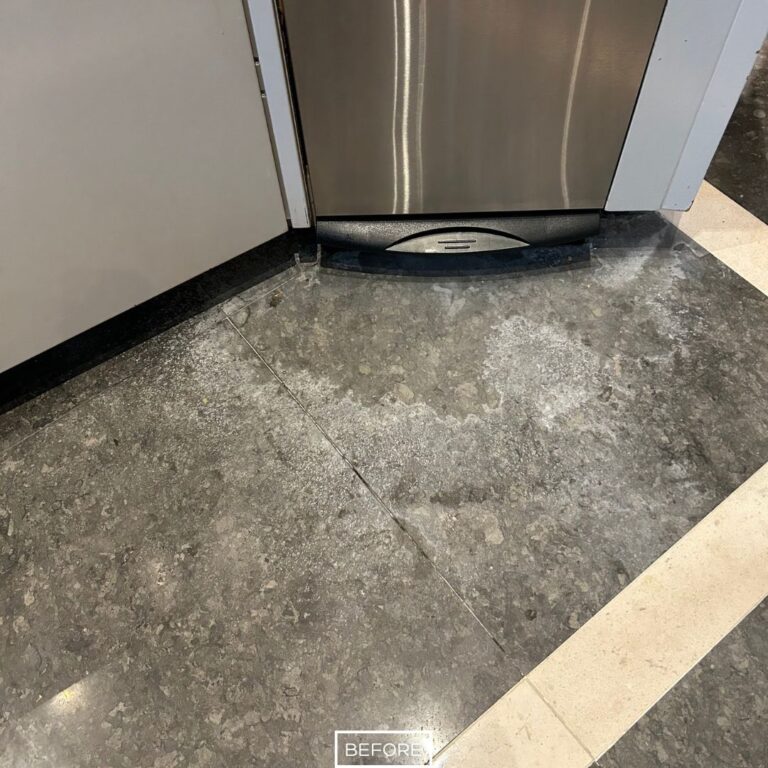 Etched limestone floor in the kitchen area of a home in Newport Beach