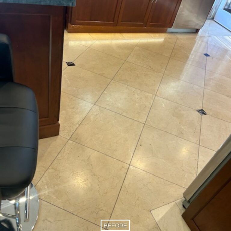 Worn marble floor in Palm Springs kitchen with scratches and low shine before restoration